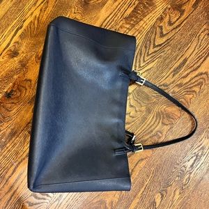 Well loved Tory Burch laptop bag